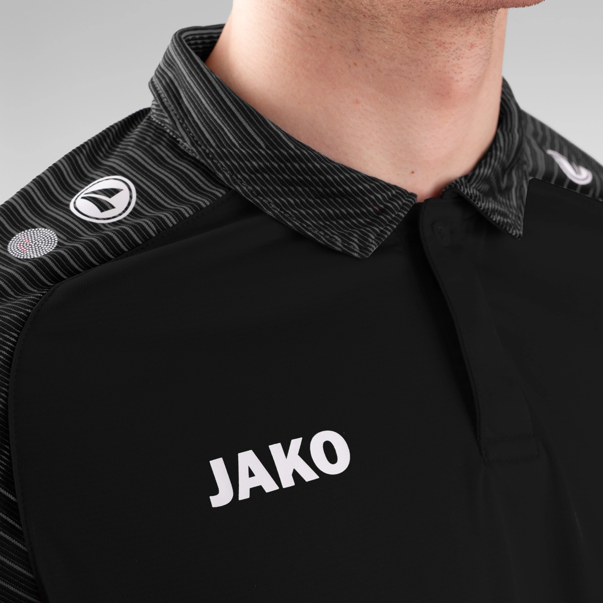 JAKO Polo_Performance A4T024HR6322 804 schwarz/anthra light