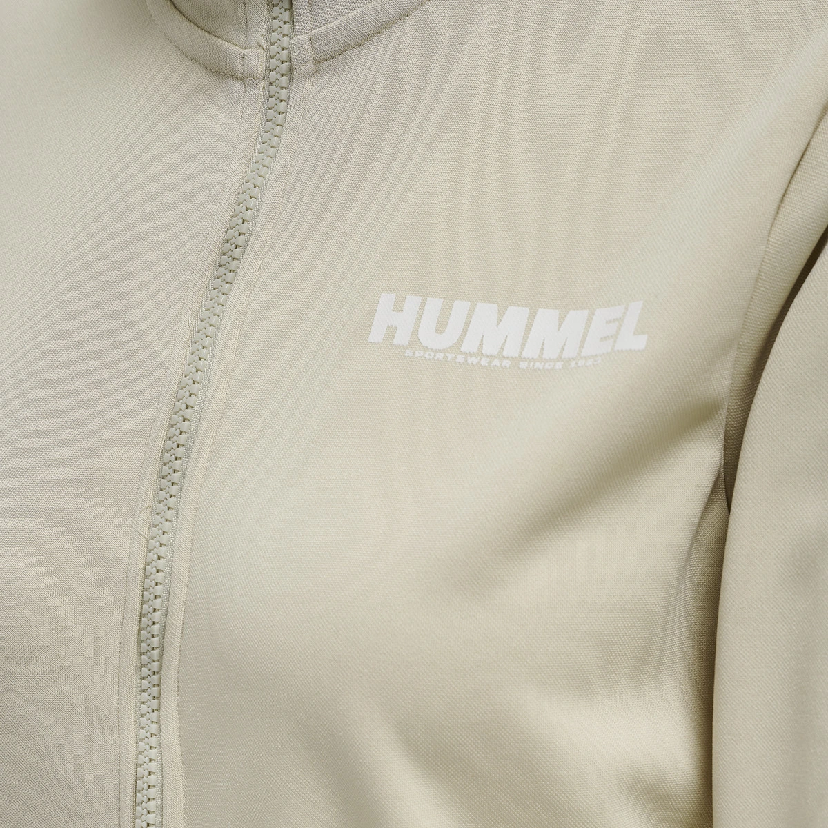HUMMEL HUMMEL_Damen_Unterjacke_hmlLEGACY_POLY_WOMAN_ZIP_JACKET 212696 1116 PUMICE STONE
