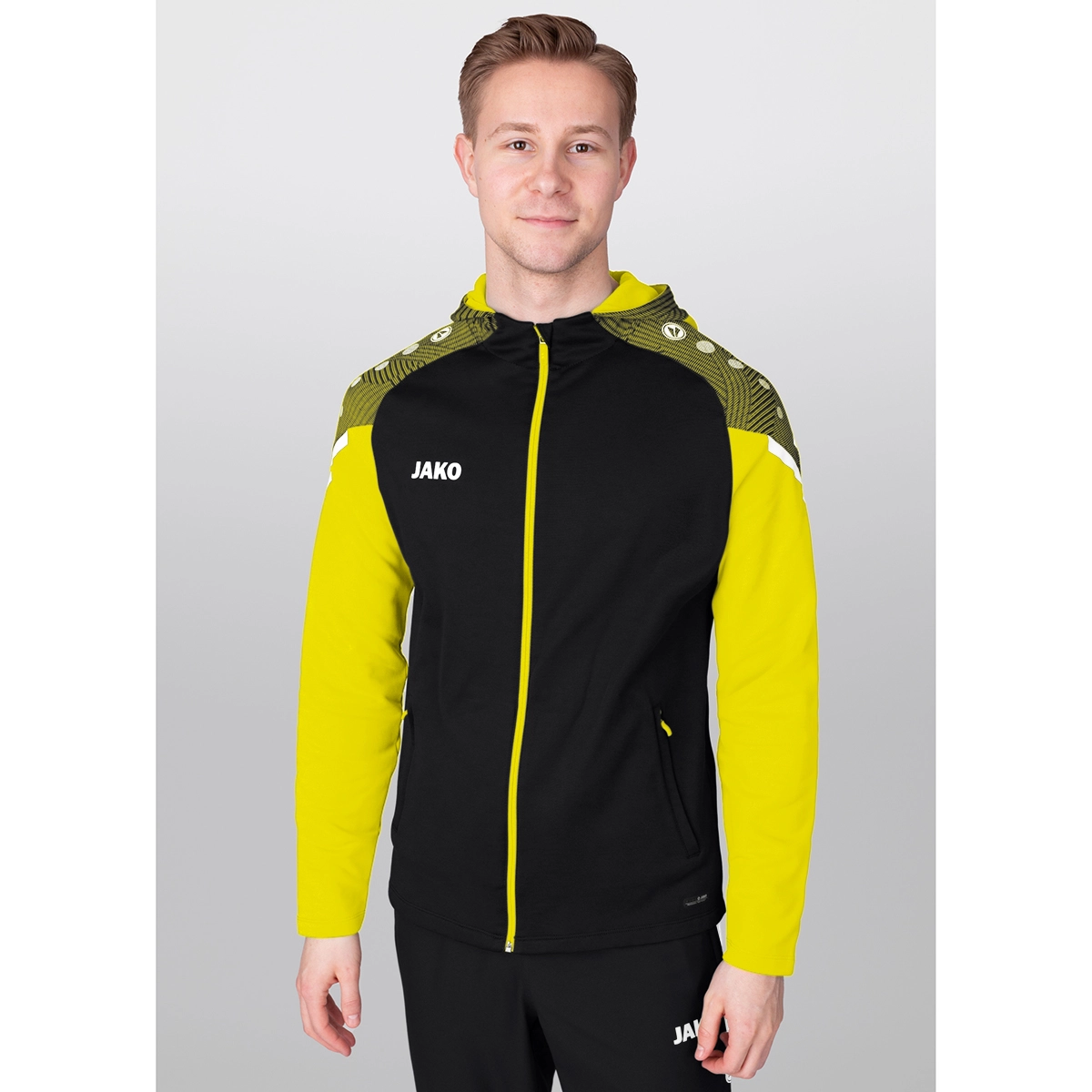 JAKO Kapuzenjacke_Performance 6822K 808 schwarz/soft yellow