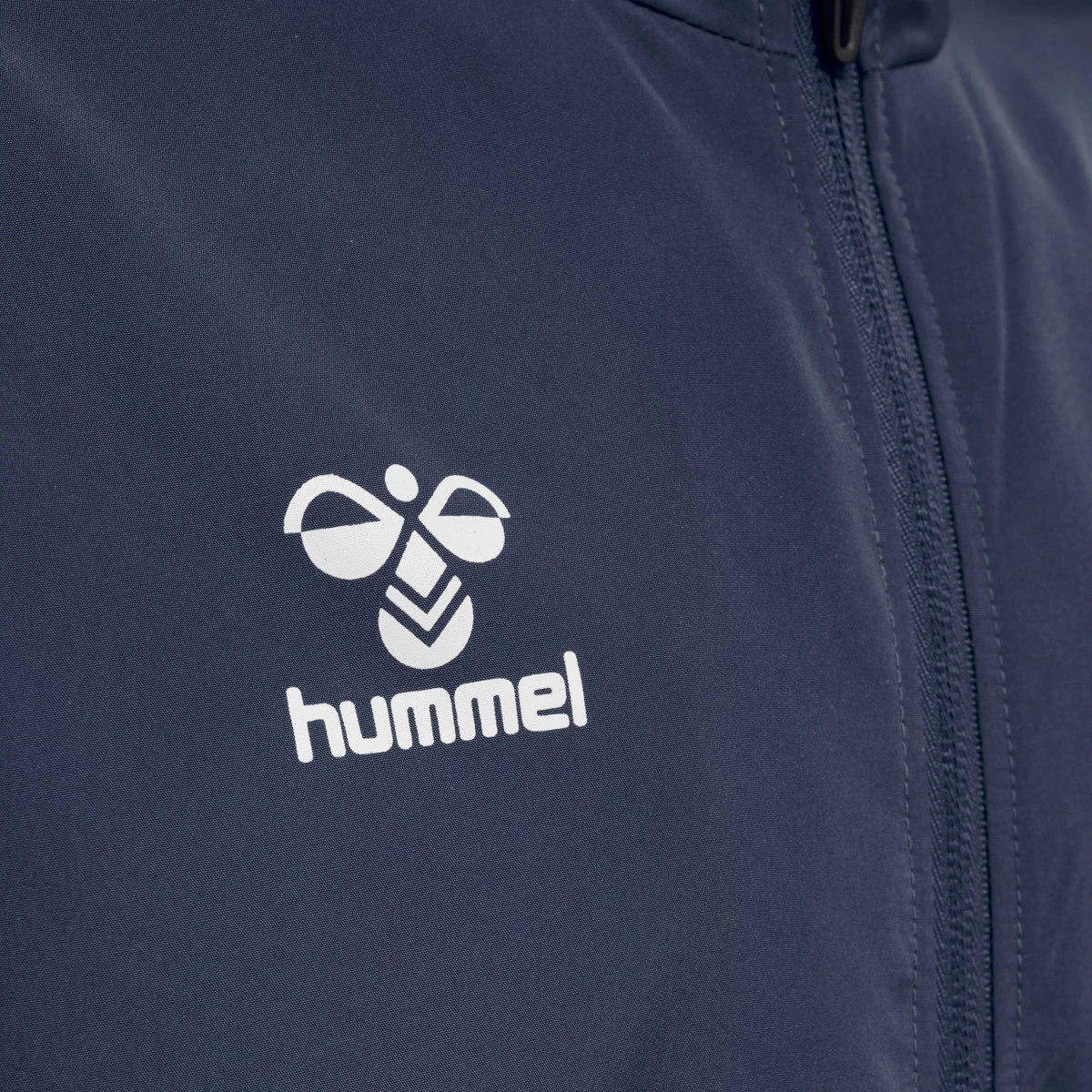 HUMMEL Unisex_Kids_hmlCORE_XK_MICRO_ZIP_JACKET_KIDS 212654 7026 MARINE