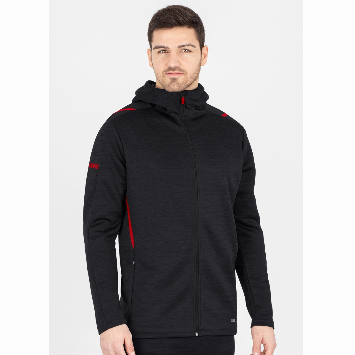 JAKO Freizeitjacke_Challenge_mit_Kapuze 9821 502 schwarz meliert/rot