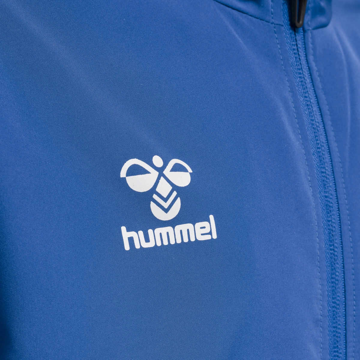 HUMMEL HUMMEL_Unisex_Kids_hmlCORE_XK_MICRO_ZIP_JACKET_KIDS 212654 7045 TRUE BLUE